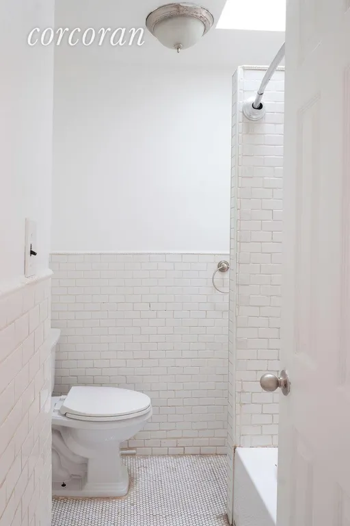 New York City Real Estate | View 441 Halsey Street, 3 | Skylight and classic Subway tile | View 4