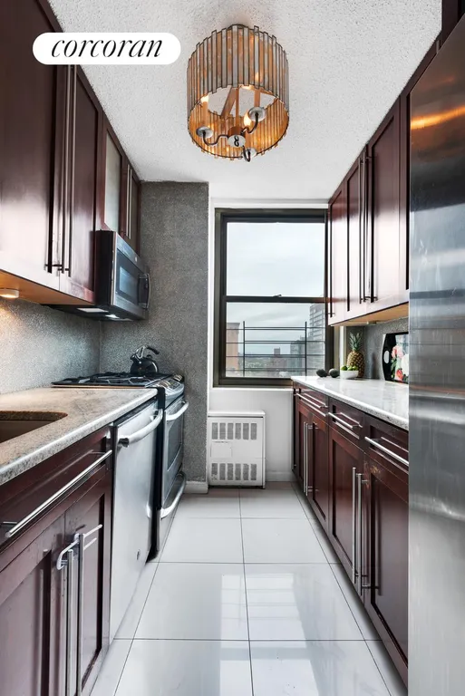 New York City Real Estate | View 301 East 79th Street, 22J | Luxurious Windowed Kitchen | View 4