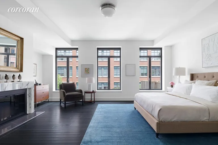 New York City Real Estate | View 145 West 11th Street, TH1 | Master bedroom with wood burning fireplace | View 6