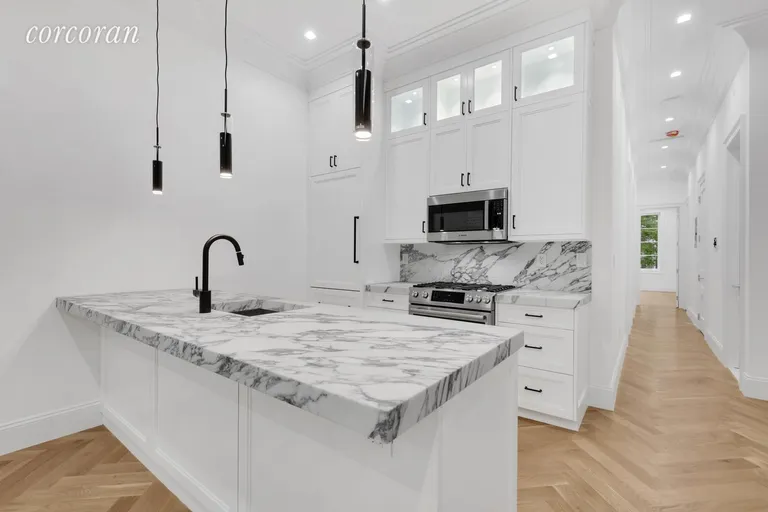 New York City Real Estate | View 972A Saint Johns Place | Open Kitchen w/ Custom Cabinetry & Carrera Marble | View 3