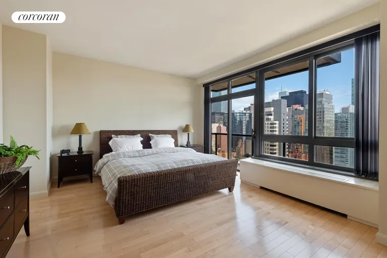 New York City Real Estate | View 100 United Nations Plaza, 29D | Master bedroom with private balcony | View 4