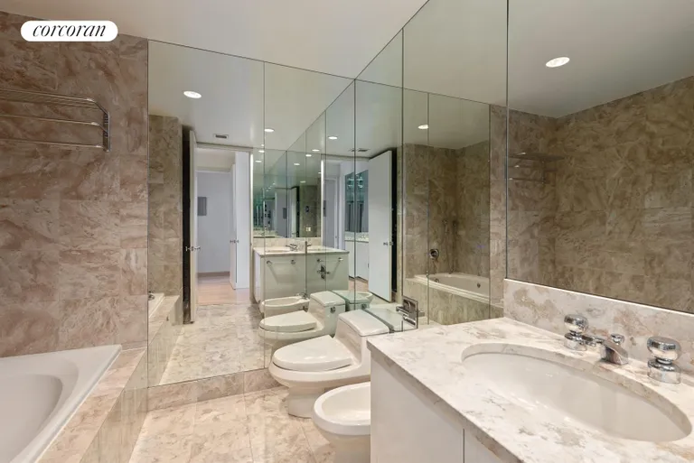 New York City Real Estate | View 100 United Nations Plaza, 29D | 5-piece en suite marble master bathroom | View 5
