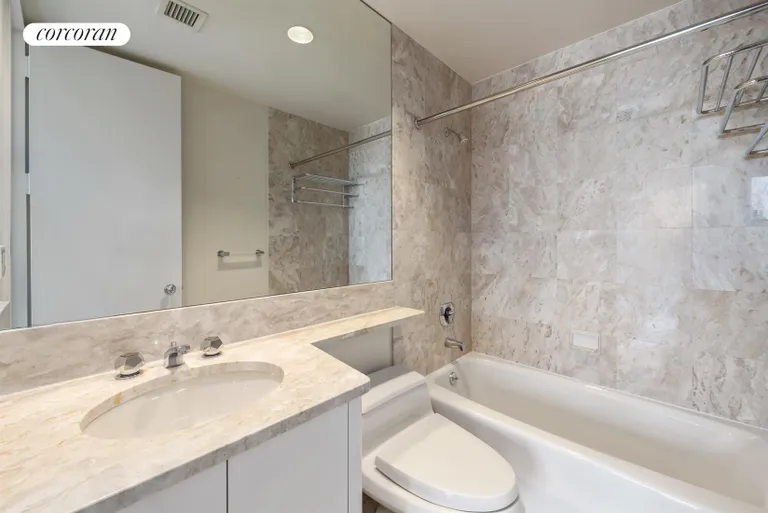 New York City Real Estate | View 100 United Nations Plaza, 29D | Marble bathroom  | View 8