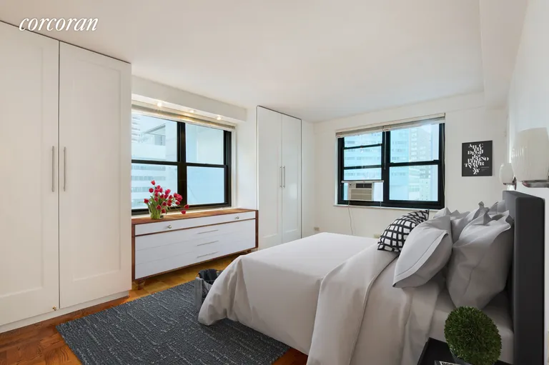 New York City Real Estate | View 135 East 54th Street, 6B | Corner master bedroom, image virtually enhanced | View 4