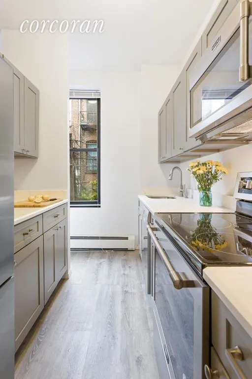 New York City Real Estate | View 195 Garfield Place, 2N | Renovated kitchen with stainless steel appliances | View 3