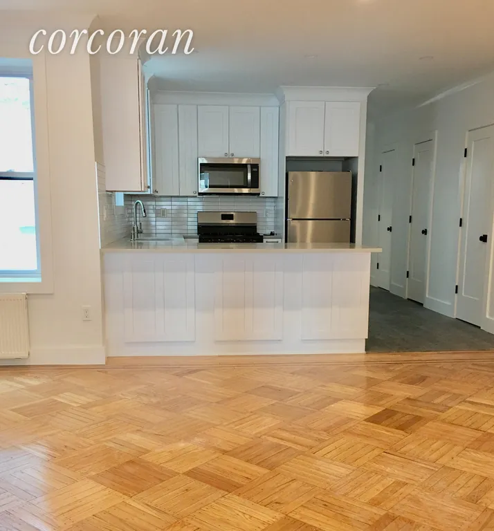New York City Real Estate | View 243 91st Street | Kitchen view from living room | View 4
