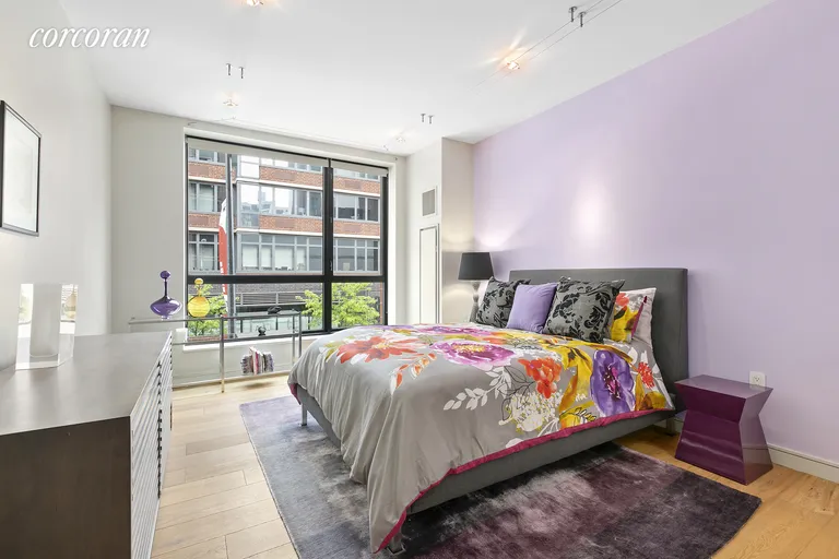 New York City Real Estate | View 540 West 28th Street, 2E | Master Bedroom with Walk-in Closet & En Suite Bath | View 4