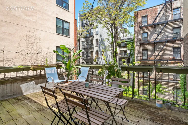 New York City Real Estate | View 251 West 21st Street, 3-4 | Private outdoor deck looking over Chelsea gardens  | View 4
