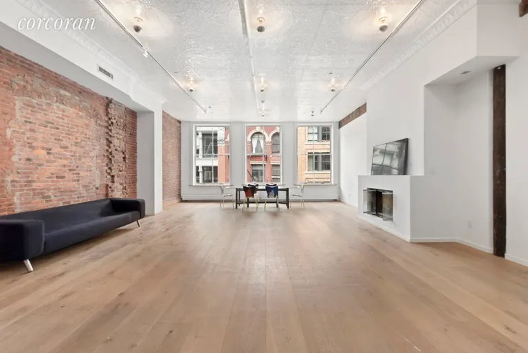 New York City Real Estate | View 46 Lispenard Street, 4W | Great Room with Wood burning fireplace! | View 2
