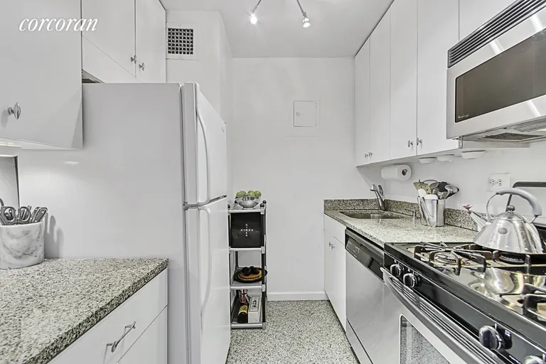 New York City Real Estate | View 301 East 79th Street, 31G |  granite counters & Floors, Stainless oven & stove | View 4
