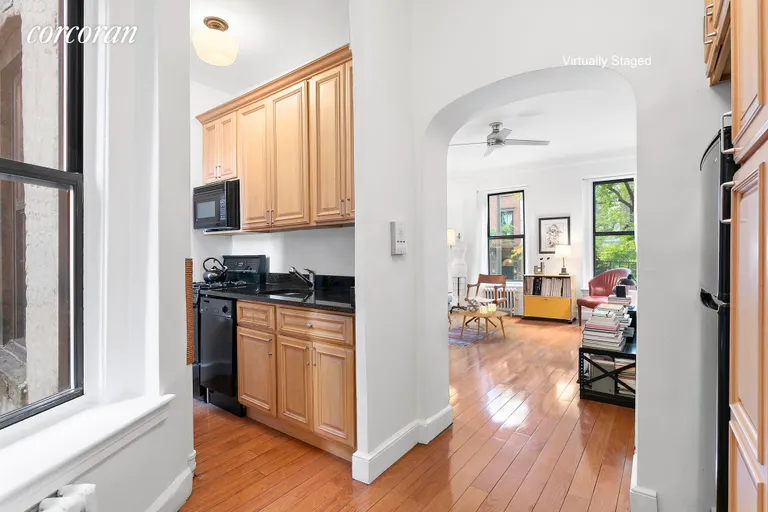 New York City Real Estate | View 317 East 18th Street, 2C | Lovely archway separating kitchen from living room | View 4