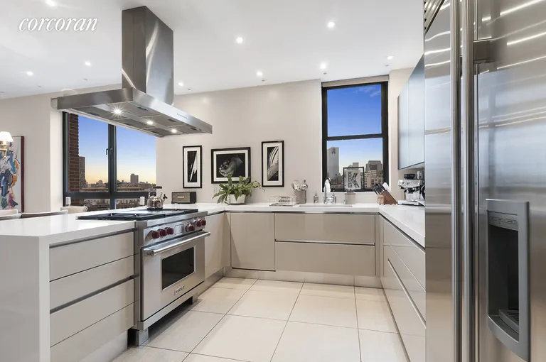 New York City Real Estate | View 2 Cornelia Street, 1004-05 | Magnificent chef's kitchen with tons of storage  | View 3