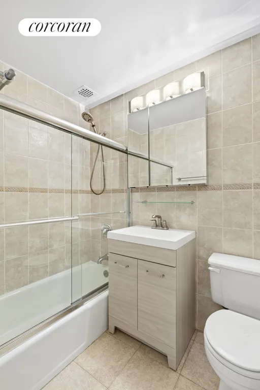 New York City Real Estate | View 310 East 23rd Street, 9C | Neutral Renovated Bathroom  | View 4