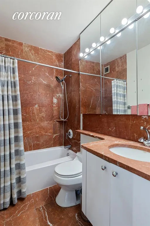 New York City Real Estate | View 343 East 74th Street, 9E | Marble bathroom | View 4