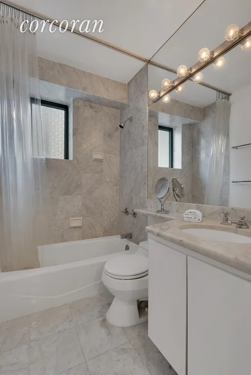 New York City Real Estate | View 45 East 25th Street, 33A | SPARKLING WHITE MARBLE BATH! | View 6