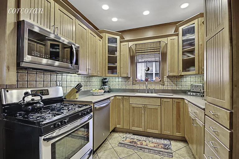 New York City Real Estate | View 6617 Duryea Court | Cabinets with surprises throughout | View 2