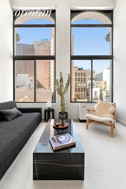 New York City Real Estate | View 67 East 11th Street, 320 | 2 Arched Windows | View 3