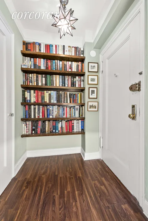 New York City Real Estate | View 70 Remsen Street, 5J | Foyer with coat closet and built in book shelves | View 3