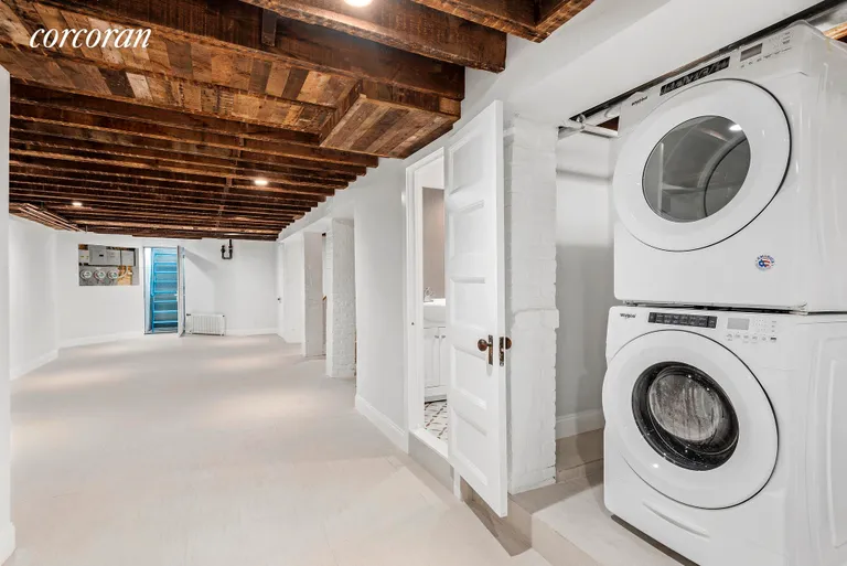 New York City Real Estate | View 215 Brooklyn Avenue, 1 | Rec Room with Laundry and a Half Bathroom | View 6