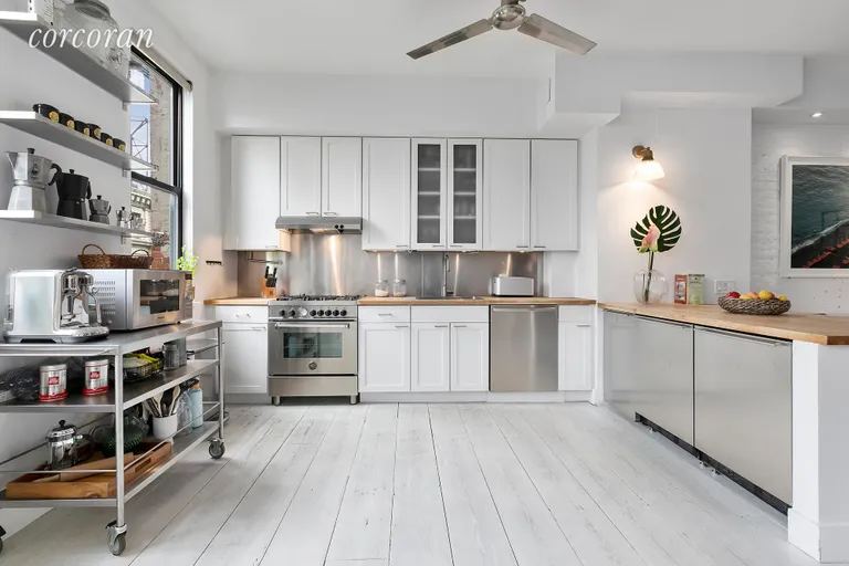 New York City Real Estate | View 138 Broadway, 5G | Open kitchen with plenty of cabinets and counters | View 4