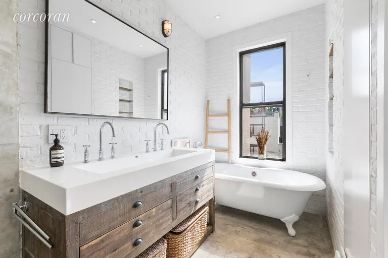 New York City Real Estate | View 138 Broadway, 5G | Exquisite, en suite & windowed master bathroom | View 10