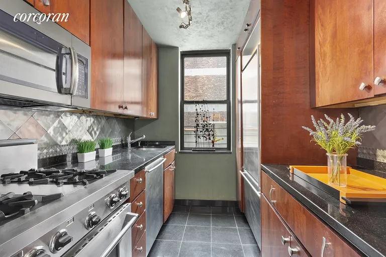 New York City Real Estate | View 222 West 14th Street, 7B | Windowed Galley Kitchen | View 4