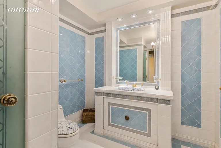 New York City Real Estate | View 100 United Nations Plaza, 42D | Versace En suite master bathroom with shower stall | View 8