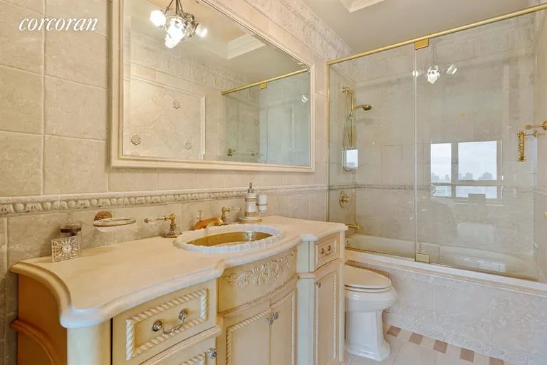 New York City Real Estate | View 100 United Nations Plaza, 42D | En suite 2nd bathroom with custom stone tile | View 10