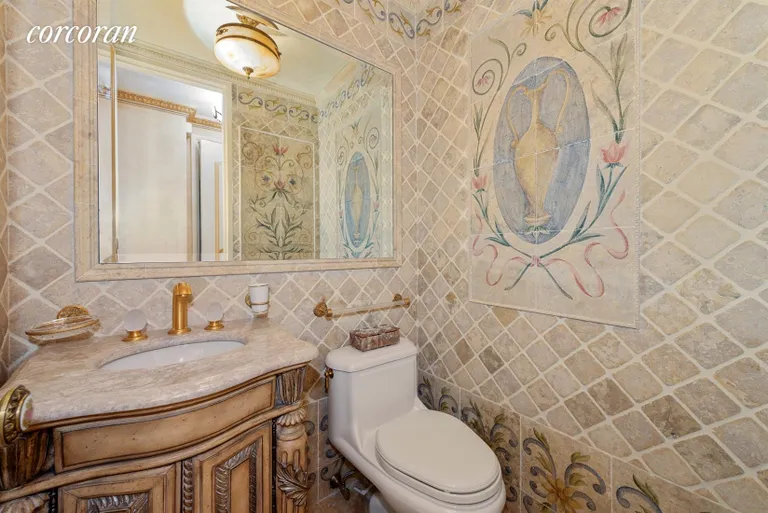 New York City Real Estate | View 100 United Nations Plaza, 42D | Powder room with custom stone tile | View 11