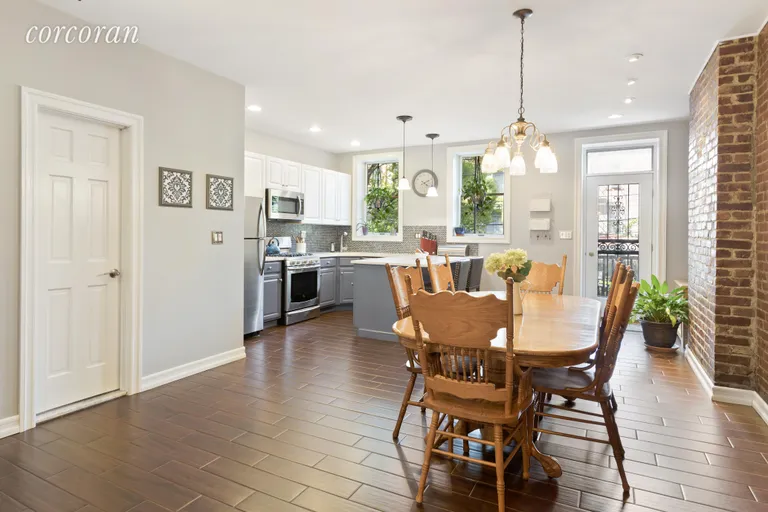 New York City Real Estate | View 233 12th Street | Large dining area off kitchen opens to backyard | View 2