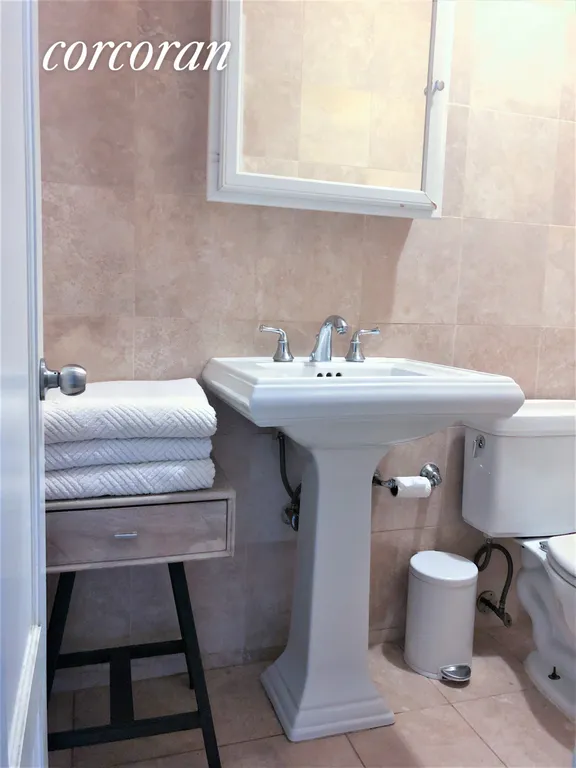 New York City Real Estate | View 245 West 115th Street, 14 | Renovated Bathroom | View 3