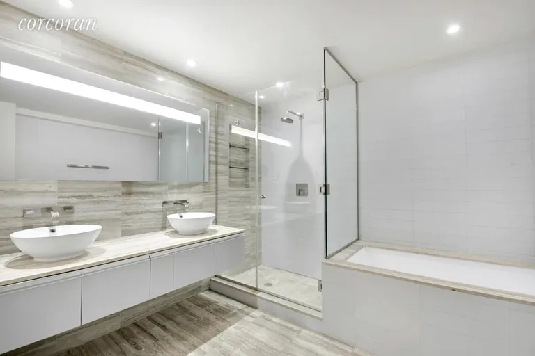 New York City Real Estate | View 322 West 57th Street, 41P1 | Master bath | View 4
