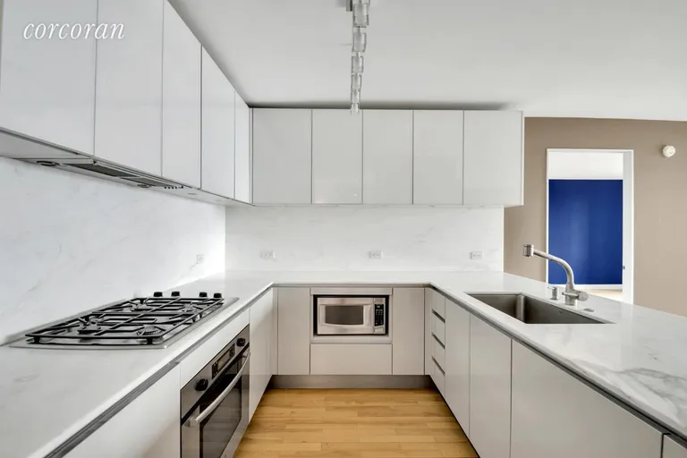 New York City Real Estate | View 322 West 57th Street, 41P1 | Kitchen | View 5