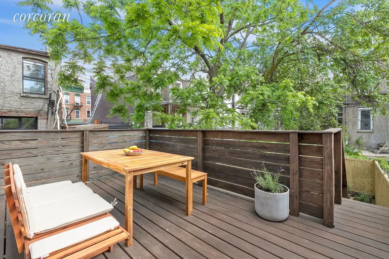 New York City Real Estate | View 436A Marion Street | Large deck perfect for outdoor dining! | View 7