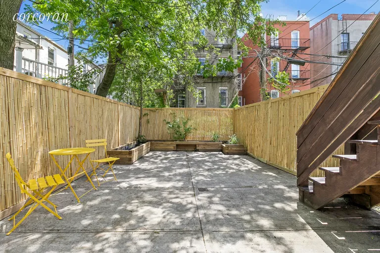 New York City Real Estate | View 436A Marion Street | Shaded backyard with New Bamboo Fence! | View 13