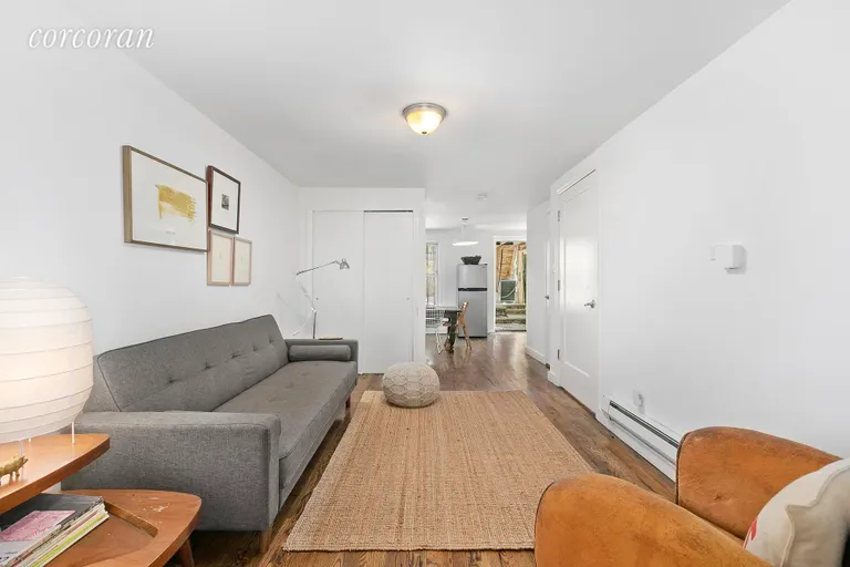 New York City Real Estate | View 436A Marion Street | Large living room in the garden level rental! | View 15