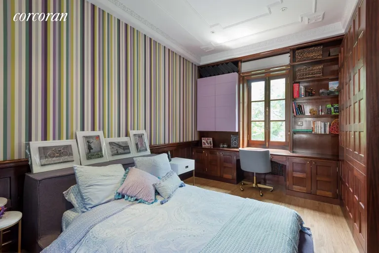 New York City Real Estate | View 35 East 68th Street, 3/4 | Large, Charming Bedroom with Wood Paneling | View 6