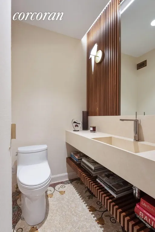 New York City Real Estate | View 35 East 68th Street, 3/4 | Powder Room with Mosaic Tiling | View 10