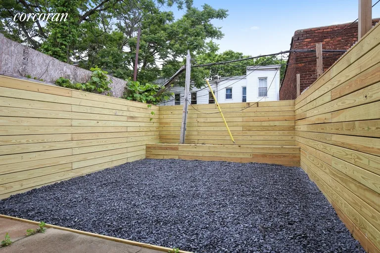 New York City Real Estate | View 89A Cooper Street, 1 | Private Yard w/ BBQ Landing | View 4