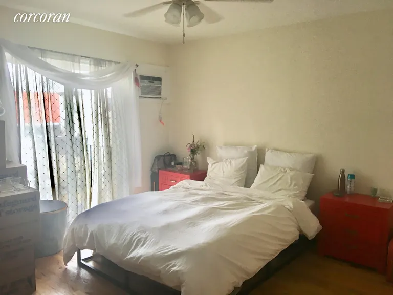 New York City Real Estate | View 89A Cooper Street, 1 | Sunny Bedroom with built in AC  | View 14