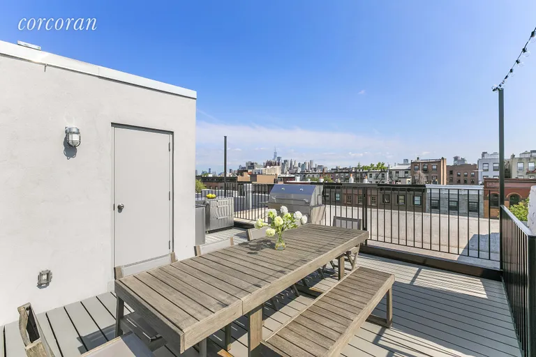 New York City Real Estate | View 86 2nd Place, 4 | Private outdoor kitchen with amazing views | View 5