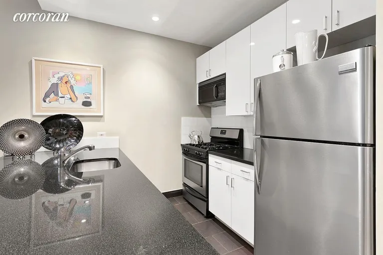 New York City Real Estate | View 31 West 82nd Street, PARLOR | Open Kitchen/Granite Counters | View 2