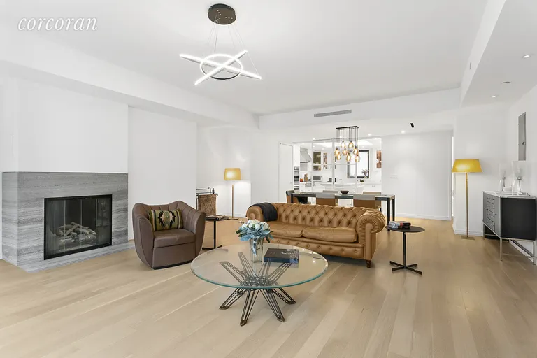 New York City Real Estate | View 210 West 77th Street, 17 | Living Room and Kitchen | View 2