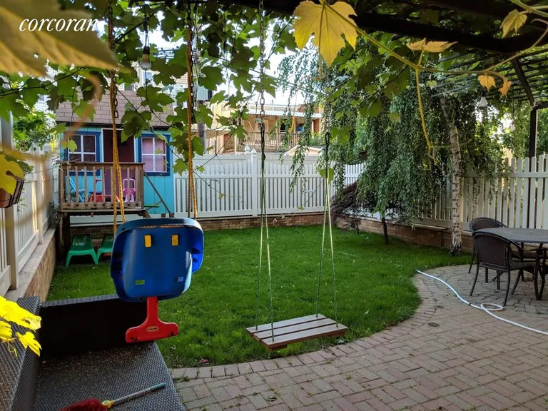 New York City Real Estate | View 60-48 56th Street, 2L | Lush Private Backyard space | View 7