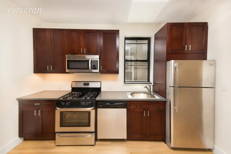New York City Real Estate | View 989 Seneca Avenue, 2 | Kitchen Empty | View 11