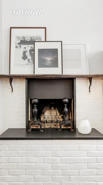 New York City Real Estate | View 100 Newel Street, 1L | Wood Burning Fireplace | View 2