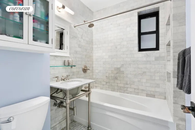 New York City Real Estate | View 229 East 79th Street, 5F | Lux Bathroom with Marble Heated Floor Tile | View 5