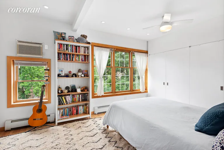 New York City Real Estate | View 641 Warren Street | Large bedroom looks out over treetops | View 6