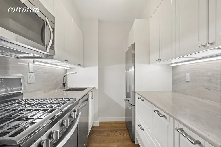 New York City Real Estate | View 30 East 9th Street, 1E | Stylish Galley Kitchen! | View 5