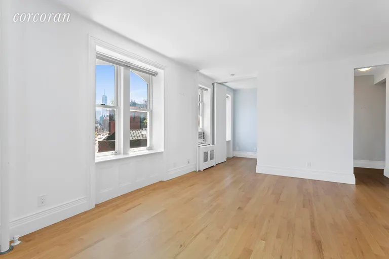 New York City Real Estate | View 25 Charles Street, 5A | Large Bright Living Room and Alcove Bedroom/Office | View 2
